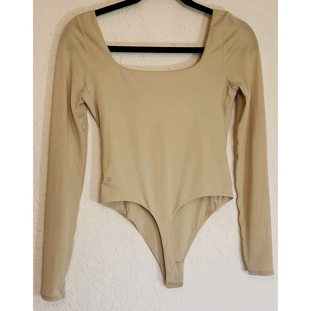 lululemon Wondermost Ultrasoft Nulu Square Neck Lg Sleeve Body suite Size SP Tan